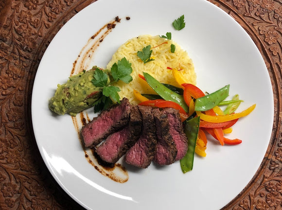 The fresh Viridescent guacamole goes so well with this grilled steak. Try your own version of this quick & easy recipe by adding some different veggies of choice. Re-think hot sauce with Hurt Berry Farm. 